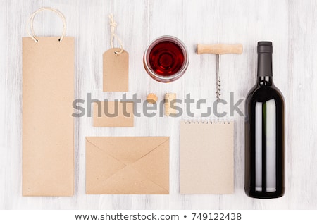 ストックフォト: Corporate Identity Template For Wine Industry With Bottle Red Wine And Wineglass On Soft White Wood