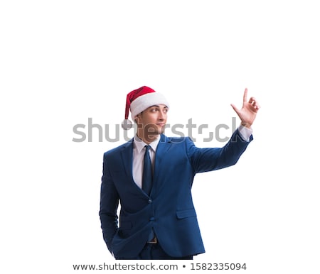 Foto stock: Young Busnessman Wearing Santa Hat In Christmas Concept On White