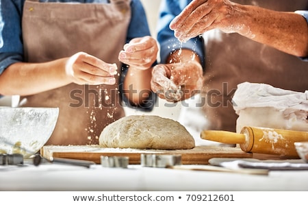 Foto stock: Woman Preparing Biscuits On Wooden Table