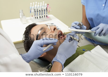 Stock fotó: Male Patient Being Checked By Dentist