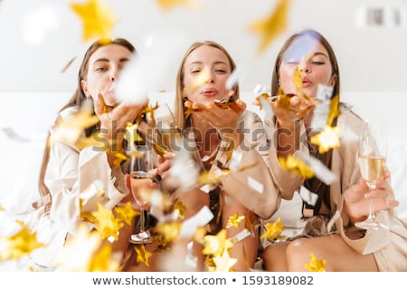 Stock fotó: Three Cheerful Girls Friends Wearing Dressing Gowns