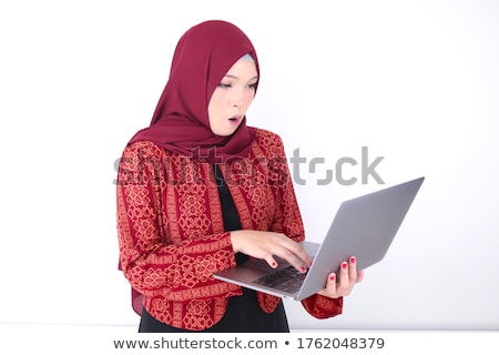 Stock foto: Young Asian Islam Woman Is Shock When Holding And Working On Laptop Computer Isolated White Backgrou