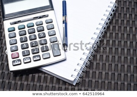 Сток-фото: Calculator Pen On Book