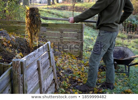Stock photo: Man Holding Tool Box And Wooden Planks