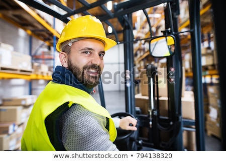 Foto stock: Forklift Driver