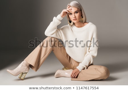 Сток-фото: Blonde Fashionable Woman Posing In Studio