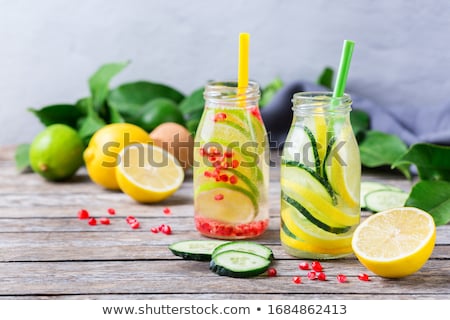 Stok fotoğraf: Infused Pomegranate Water With Fresh Lemon And Ice Cold Healthy Refreshing And Detox Drink