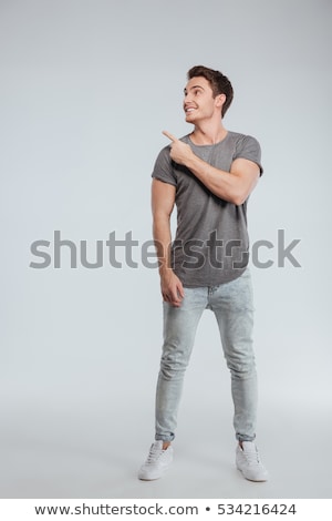 Stockfoto: Full Length Portrait Of A Happy Young Man
