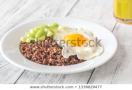 Stock photo: Portion Of Red Quinoa With Fried Egg And Celery