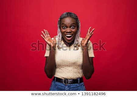 Foto stock: Portrait Of A Surprised Young African Woman