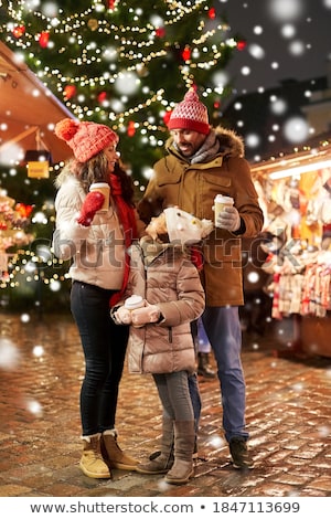 Stock fotó: Woman With Coffee Over Christmas Tree In Tallinn