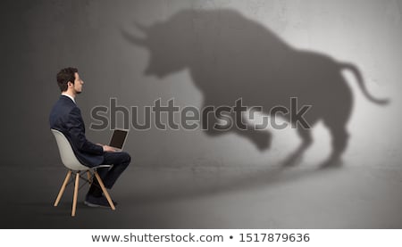 Stockfoto: Businessman Staying And Offering Stuffs To A Huge Businessman Shadow