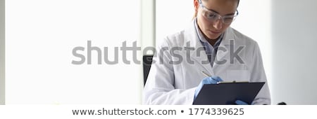 Сток-фото: Lab Technician Analyzing Test Results