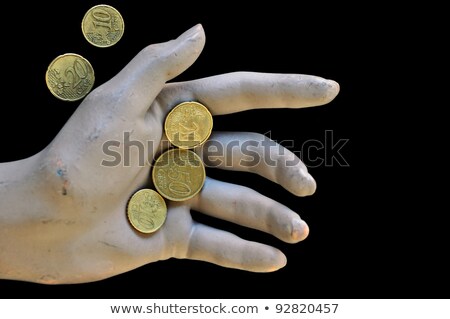 Stock photo: Spare Change Worn Hand Holding Money Coins