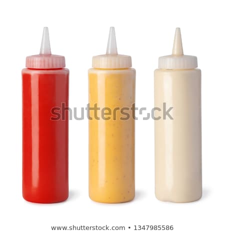 Stok fotoğraf: A Mayonnaise And Tomato Ketchup Bottles Isolated