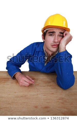 Stock foto: Young Craftsman With Sulky Expression