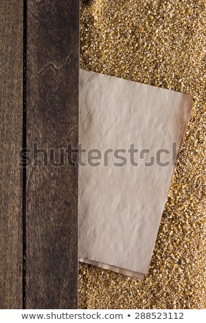 Stock photo: Old Paper Sheet On The River Sand