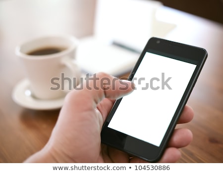 [[stock_photo]]: Businessman With Mobile Phone And Pen