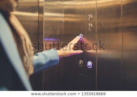 Zdjęcia stock: People Using Elevator Going Up