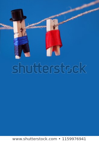 Stock fotó: Man Hanging On Clothesline