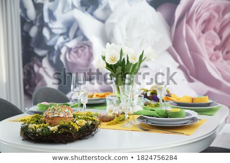 ストックフォト: Easter Bread Colorful Eggs And Yellow Tulips On White Background