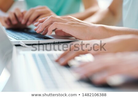 Hands Of Young Students Or Schoolkids Touching Keys Of Laptop Keypad Сток-фото © Pressmaster