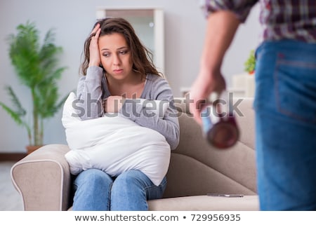 Stockfoto: Domestic Violence Concept In A Family Argument With Drunk Alcoho