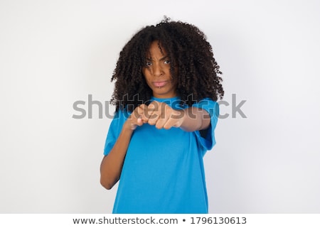 Stock photo: Young Boxer With Strong Fighting Spirit Against A White Background