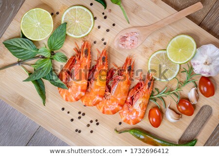 Сток-фото: Cooked Red Lobster On A Board With Lime And Salt