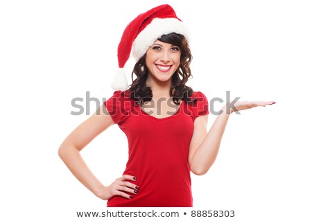 Stockfoto: Happy Woman In Santa Hat Holding Something On Palm