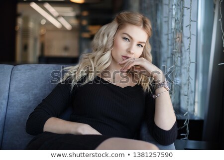 Сток-фото: Woman Drinking A Cup Of Tea In The Restaurant Winter Leisure Cold Weather Hot Drink