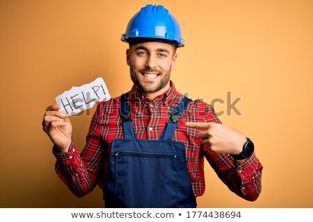 Zdjęcia stock: Optimistic Young Man Builder Pointing To Himself