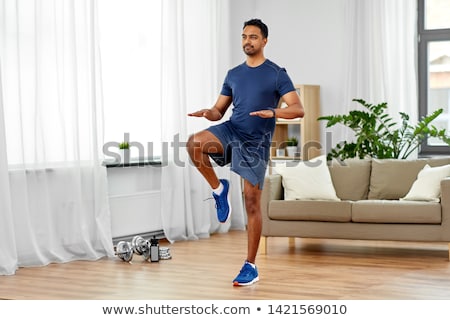 Stock foto: Indian Man Running On Spot At Home