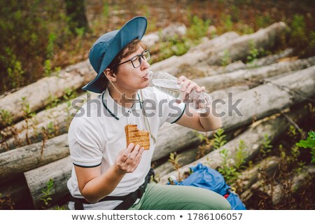 Zdjęcia stock: Hiker Resting And Having A Snack