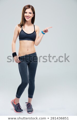 Stock photo: Slender Woman Pointing At The Camera