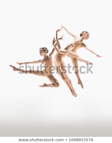 Foto stock: The Young Attractive Modern Ballet Dancer Jumping On White Background