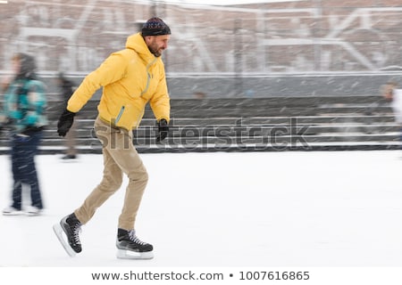 Сток-фото: Man Ice Skating Outdoors