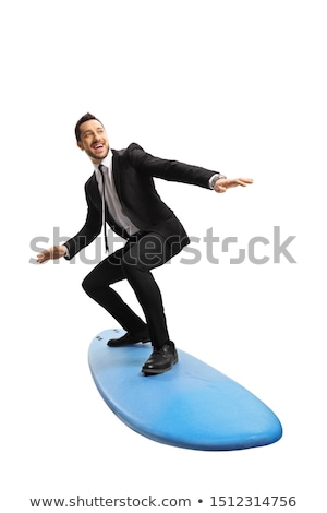 Stock photo: Happy Surfer In Action On A Surf Board