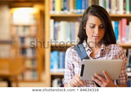 ストックフォト: Tablet Computer With Books