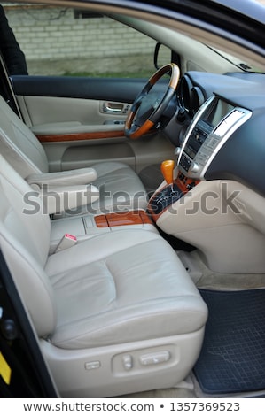 Foto stock: Modern Luxury Prestige Car Interior Dashboard Steering Wheel Perforated Leather Wooden Interior
