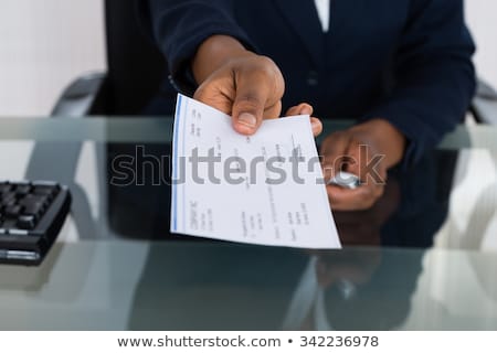 Stock photo: American African Holding Paycheck