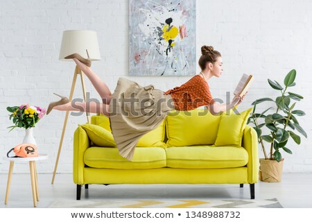 Stock photo: Levitating Young Woman In Magical Interior