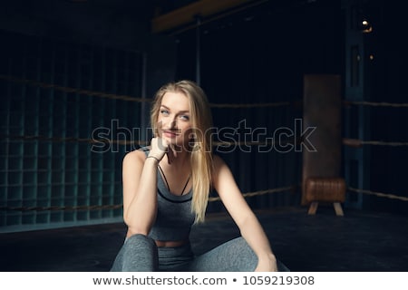 Foto stock: Female Boxer Posing Inside A Boxing Ring