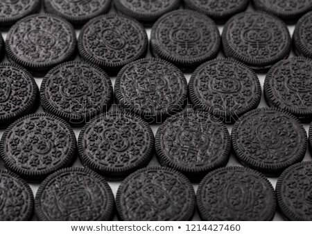 Stok fotoğraf: Sandwich Cookie Consisting Of Two Chocolate Wafers With Cream Filling Macro