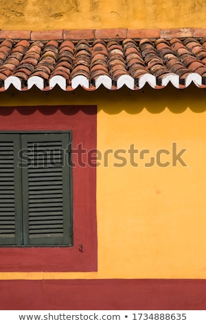 Stock foto: Detail Of Traditional Red And Yellow Facade From Madeira Island