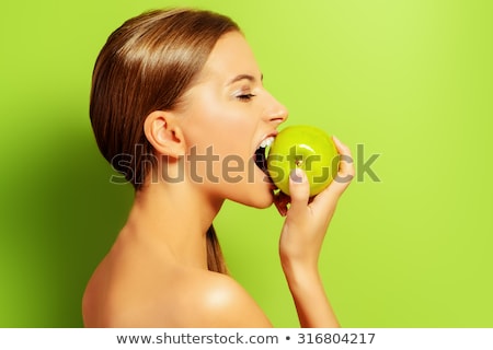 Stok fotoğraf: Girl Bites Apple