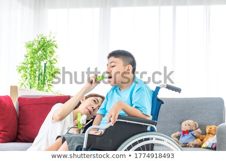 Stok fotoğraf: Disabled Woman Playing Bowls