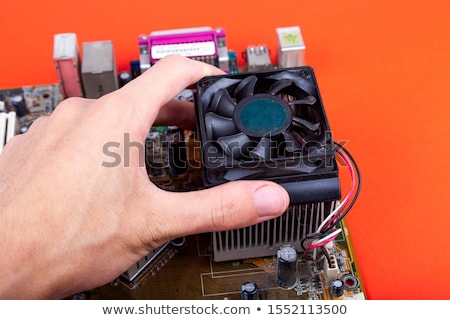 Foto stock: Hand Fixing Processor Fan