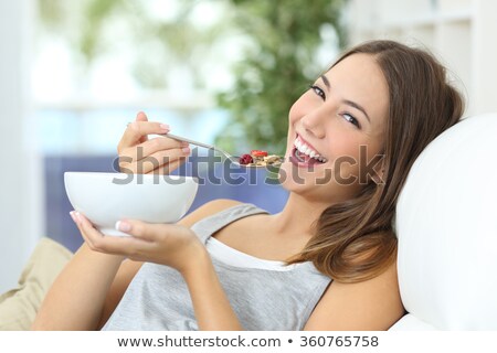 Zdjęcia stock: Woman Laughs And Eats Strawberries