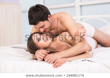 Stock fotó: Young Love Couple In Bed Romantic Scene In Bedroom